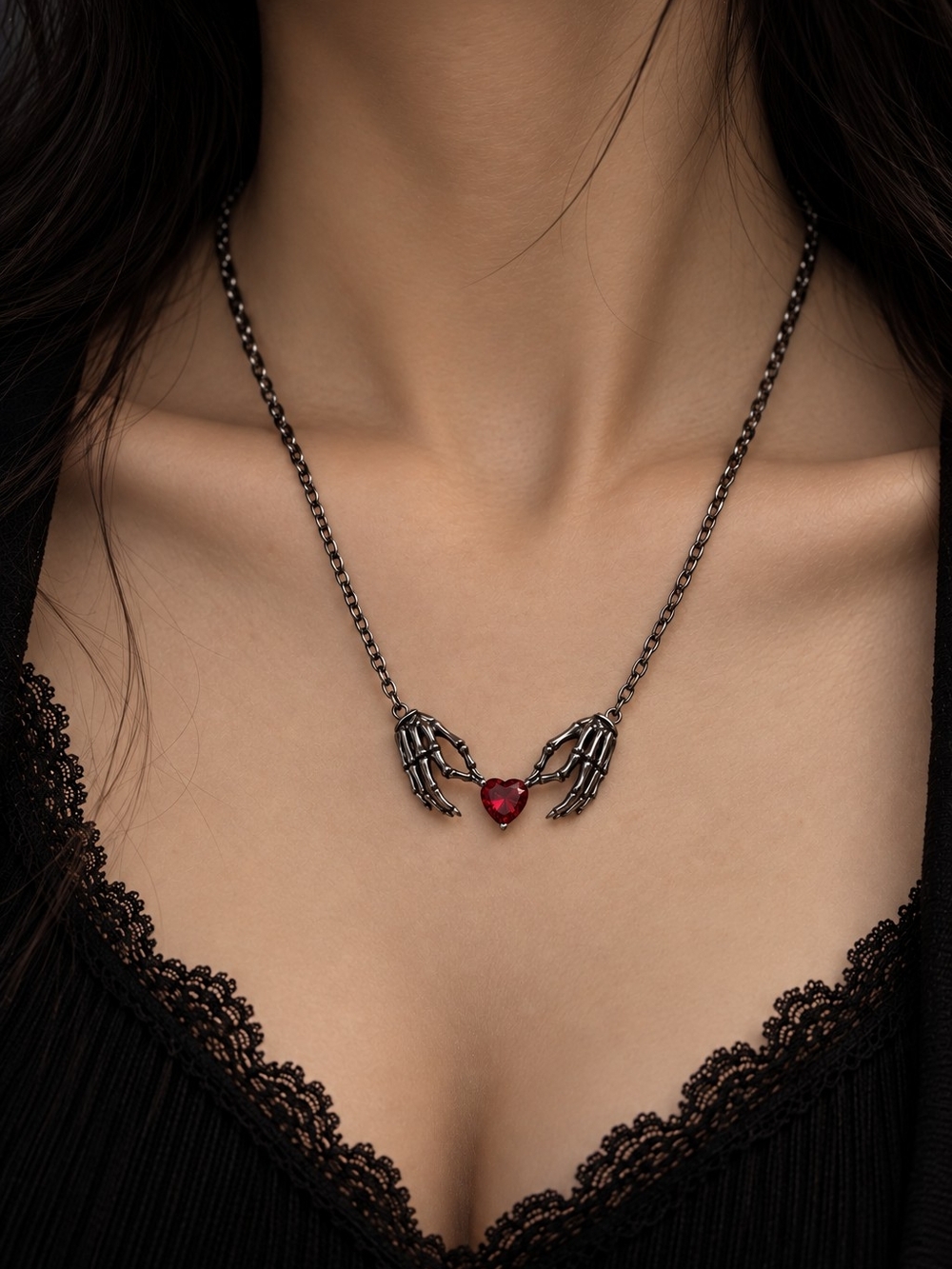 Dark Silver Skeleton Hands Necklace with Red Heart Charm